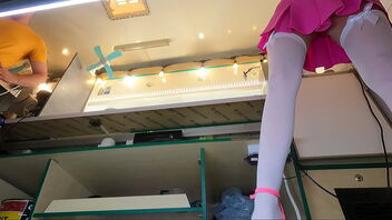 Mind-blowing 18-year-old woman at work, hidden camera captures her upskirt shots.