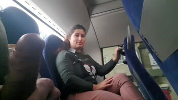 Sumptuous woman with perfect breasts shows herself off and gets a handjob on the bus