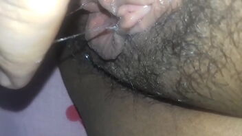 Meaty clit homemade porn with a hairy moist pussy