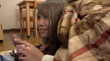 Pretty Japanese wife gets teased in a insatiable way in front of the kotatsu.